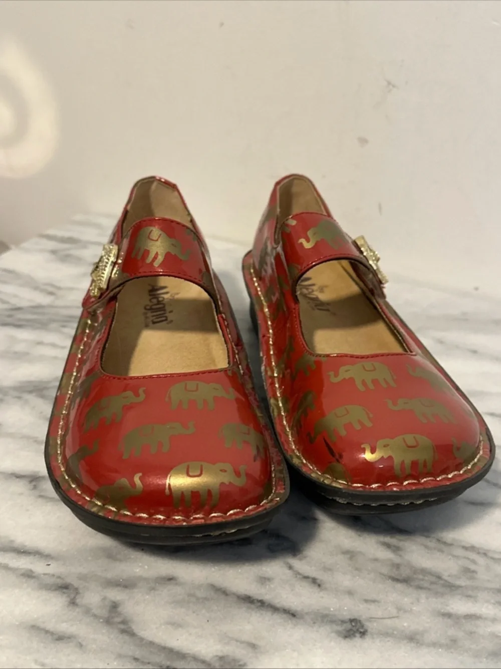 Alegria patent Red leather Mary Jane Platforms with Gold Elephant Accents